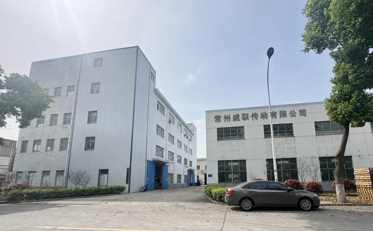 WYW Motion factory building with company sign, 2018-2020